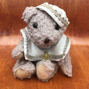 Vintage teddy bear in sailor suit.